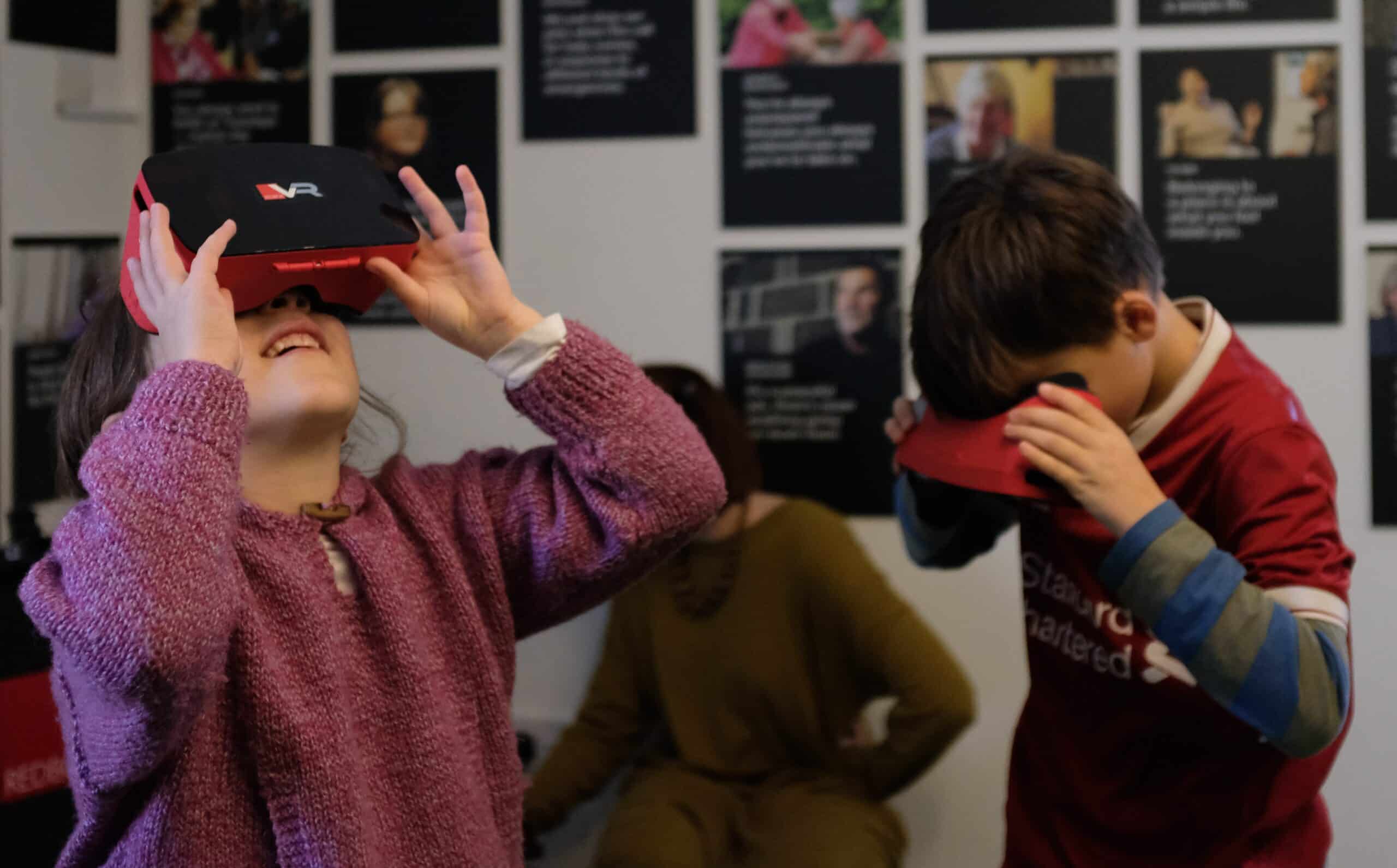 Virtual Reality headsets being used by young people