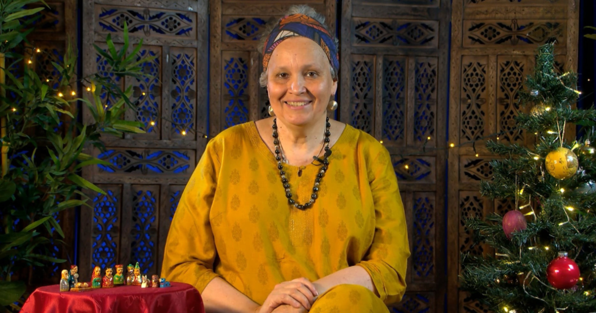 A still from the Free Nativity Story Resource video, with storyteller Sita Brand smiling.